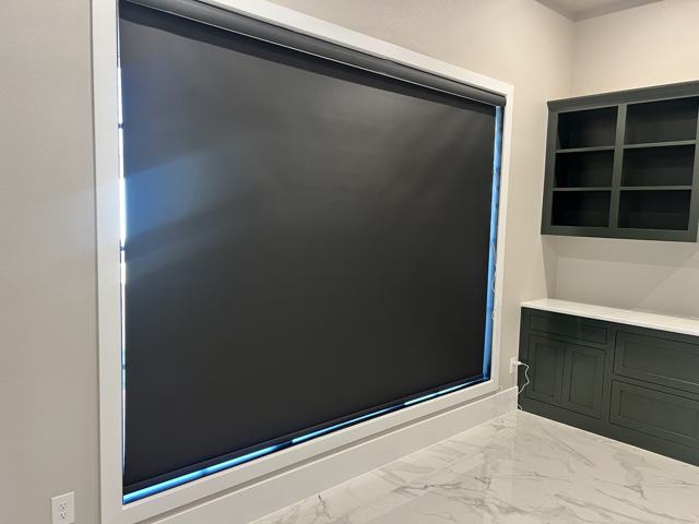 Oversized black roller shade